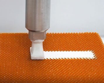 Automated honeycomb potting with a 1-component material from Von Roll 