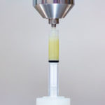 The syringes are filled by pressing the luer side against the dispenser. The unit dose are filled on the stopper side via mirror filling.